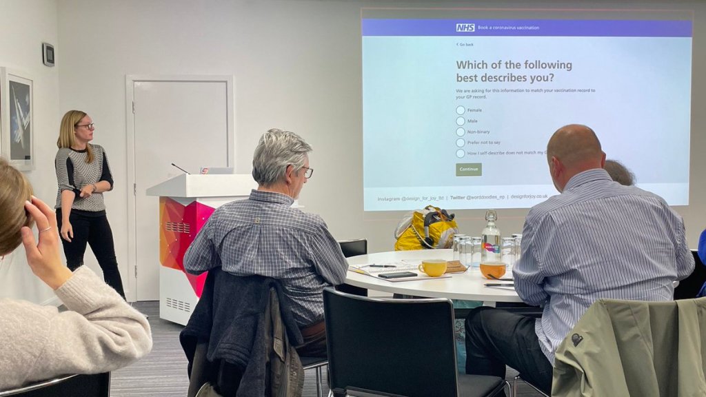 Emma Parnell describing the service design changes behind the NHS covid vaccination system to be more inclusive for trans community